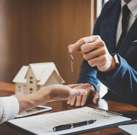 Real estate agent consulting with home buyers
