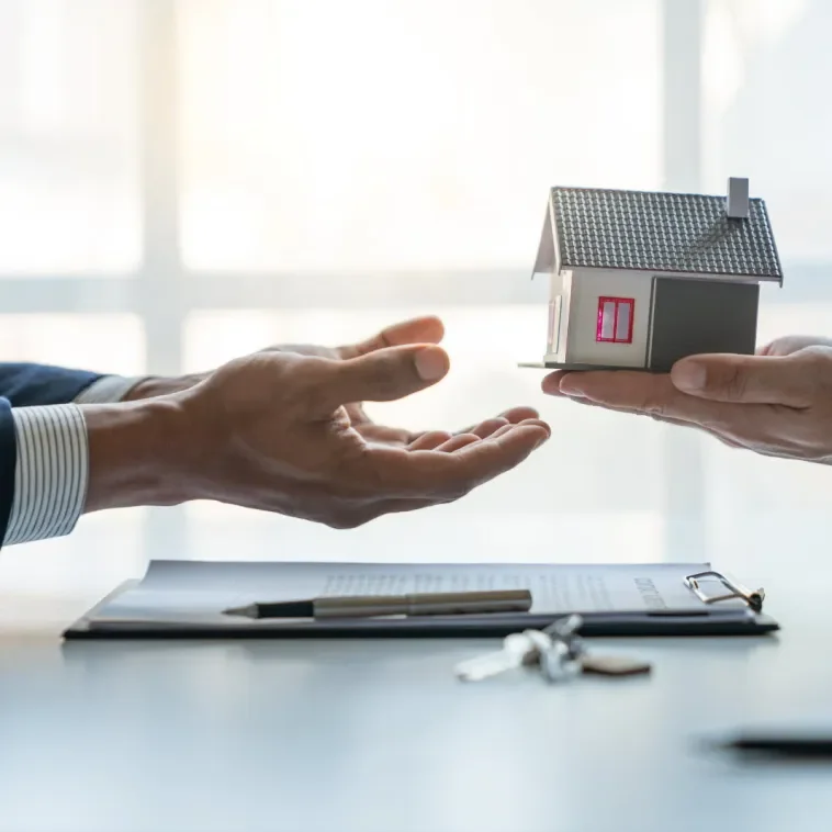 Handing over a model home during a real estate transaction